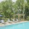 Swimming pool with chairs and gazebo 