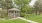 Gazebo with walkway surrounded by trees