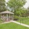 Gazebo with walkway surrounded by trees